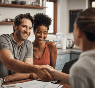 Image of a couple in a meeting with a financial advisor