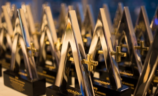 A group of trophies on the table